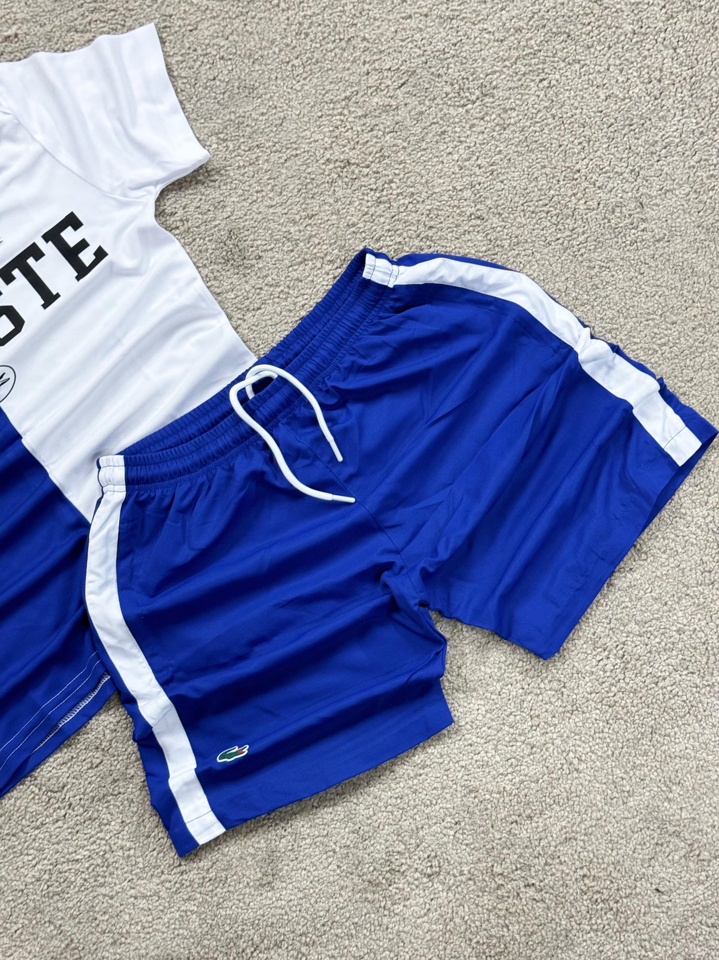 Conjunto lacoste azul-blanco