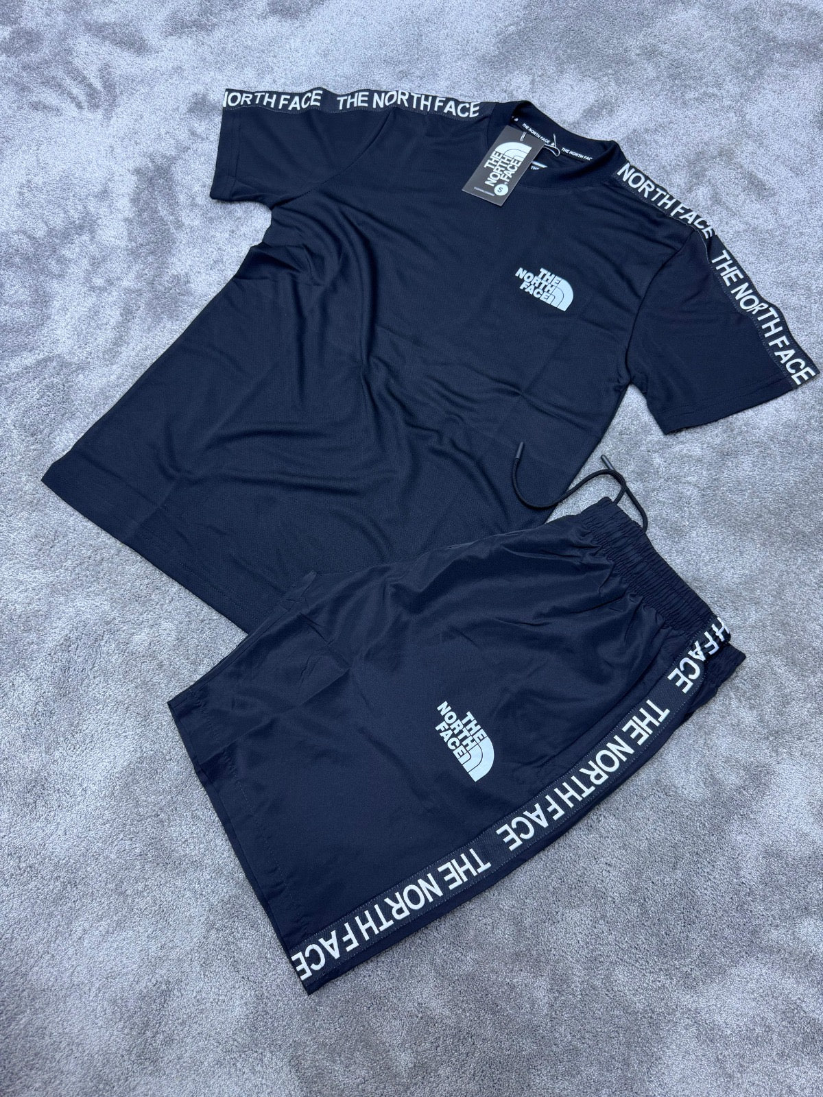 Conjunto blanco The North Face negro